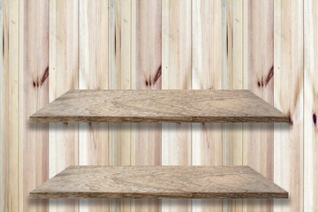 two step wooden shelf on plank wooden wall