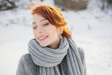 Portrait of a girl dressed in a winter image of the bride. Backg