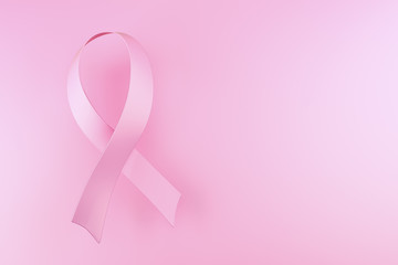 Pink ribbon symbol of social campaign on pink background 3d rend