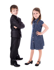 Wall Mural - little boy in business suit and girl in dress isolated on white