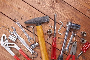 Wall Mural - Set of different work tools on wooden surface