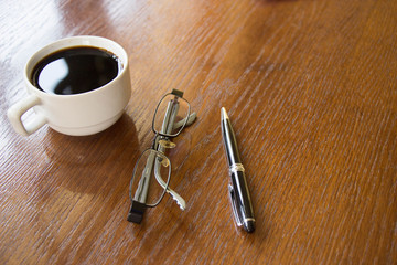 Office desk, work place with cup of coffee,Empty workspace on wh