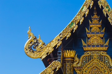 Sticker - Beautiful Golden Thai Lanna Architecture: Chapel Roof of Wat Inthakhin Sadue Muang, Chiangmai, THAILAND.