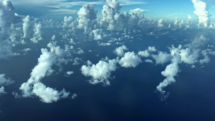 Poster - White clouds and sky, view from airplane