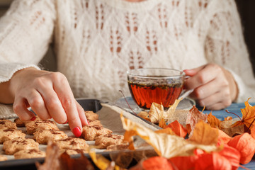 Wall Mural - cup of tea,  autumn yellow and red leaves. autumn breakfast. sel