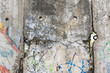 Close-up part of Berlin Wall. View from the West Berlin side of graffiti art on the Wall