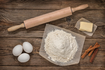 Wall Mural - Flour, eggs, butter and cooking equipment. Cooking