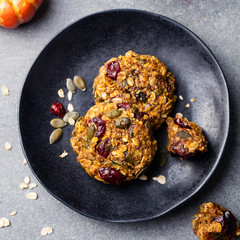 Wall Mural - Pumpkin cookies with cranberries. Top view