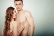 © Voyagerix - Sexy couple. Half naked man and woman in lingerie.
