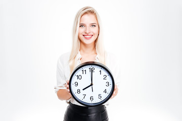 Poster - Smiling businesswoman holding big clock