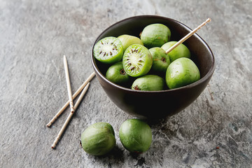 New Zealand exotic food. Berry nergi, or small kiwi. In a brown