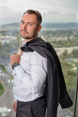 young businessman about of the window