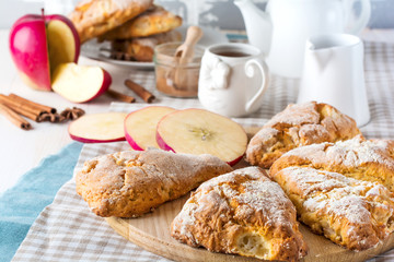 Apple scones for breakfast with apple cider glaze. Selective focus.