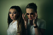 © IVASHstudio - Boy in goggles stands behind pretty girl in white shirt