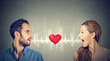 © pathdoc - Love connection. Man woman talking to each other with heart in-between