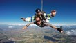 © Mauricio G - Skydiving tandem friends open arms