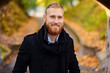 © Fxquadro - Portrait of smiling redhead male.