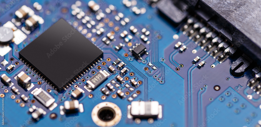 Integrated Microelectronics Integrated semiconductor microchip Stock Photo | Adobe Stock