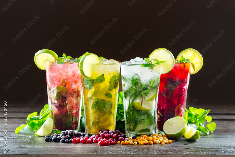 Different types of mojito cocktail on dark brown background - obrazy, fototapety, plakaty 
