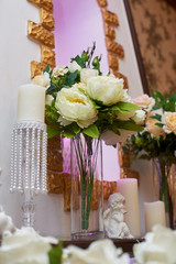 Wall Mural - bouquet of white peonies in vase decorated for a wedding dinner