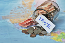 Travel Budget Concept. Travel Money Savings In A Glass Jar