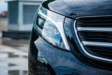 Headlights of a luxury passenger car