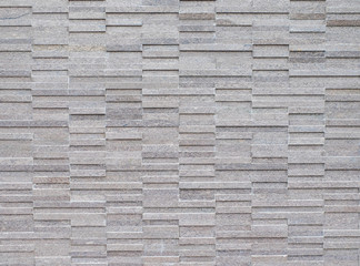 Grey tile wall texture arrange in stack pattern