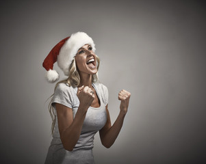 Sticker - Happy laughing girl santa cap portrait.