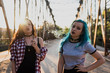 © ADDICTIVE STOCK - Two teen girls smoking on the bridge