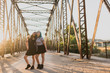 © ADDICTIVE STOCK - Two cheerful weird girls on the bridge.