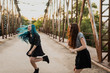 © ADDICTIVE STOCK - Teen girls dancing on the bridge.