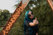 © ADDICTIVE STOCK - Girl with blue hair saying fuck you
