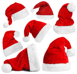 Wall Mural - Santa Claus hats isolated on white