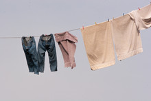 Denim Jeans Drying On A Clothes Line