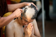 © weerajata - Young men remove hair to the ordination ceremony. The tradition