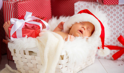 Wall Mural - sleeper newborn baby in  Christmas Santa cap