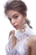 © iulskaya_photo - Beautiful girl in image of bride with flower orchid on her neck. Model with nude makeup and silk underwear. Beauty face. Photo was taken in a studio.