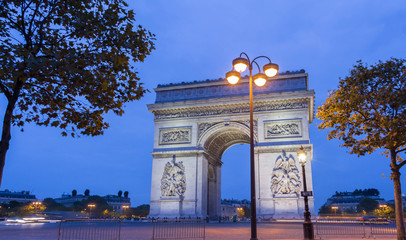 the triumphal arch at night, paris, france.