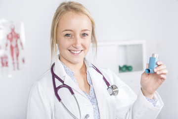 Wall Mural - Medical doctor at work with inhaler