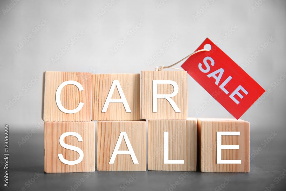 Cubes with words CAR SALE on light background
