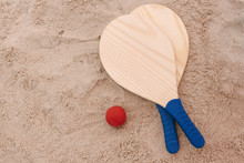 Beach Tennis, Beach Paddle Ball, Matkot. Beach Rackets And Ball On The Beach Sand