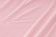 Creased Pink Cloth Material Fragment As A Background