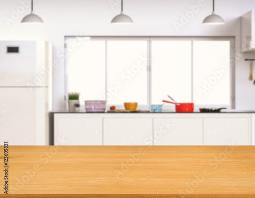 empty wooden counter top with blur kitchen background Stock
