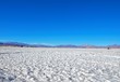 Low angle view of the Maricunga salt flats with hills in the background close to Copiapo in Chile, South America