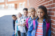 © Louis-Paul Photo - students outside school standing together