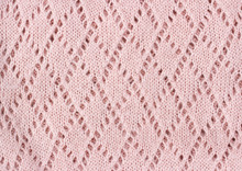 Pink Knitted Texture Winter Background.
