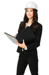 Businesswoman with notebook and hardhat isolated on white background