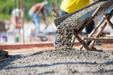 Fototapeta  - Selective focus of concrete pouring during commercial concreting floors of building