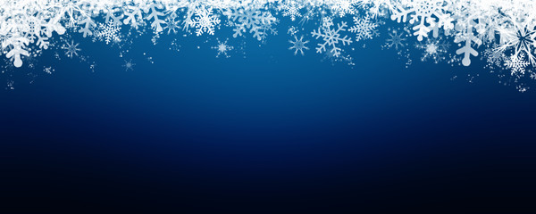 Wall Mural - Blue winter background with snow and snowflackes.