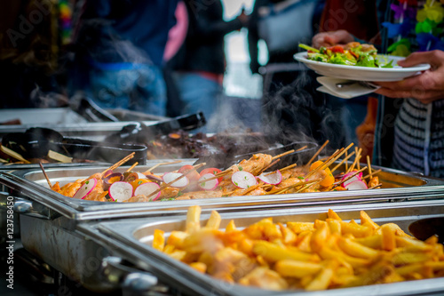 Fotografie, Obraz Delicious buffet in a restaurant with meat and fries